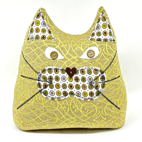 Spring green cat doorstop with vintage green brown and black detail