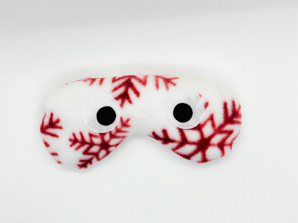 eye mask in winter white with crimson snowflakes