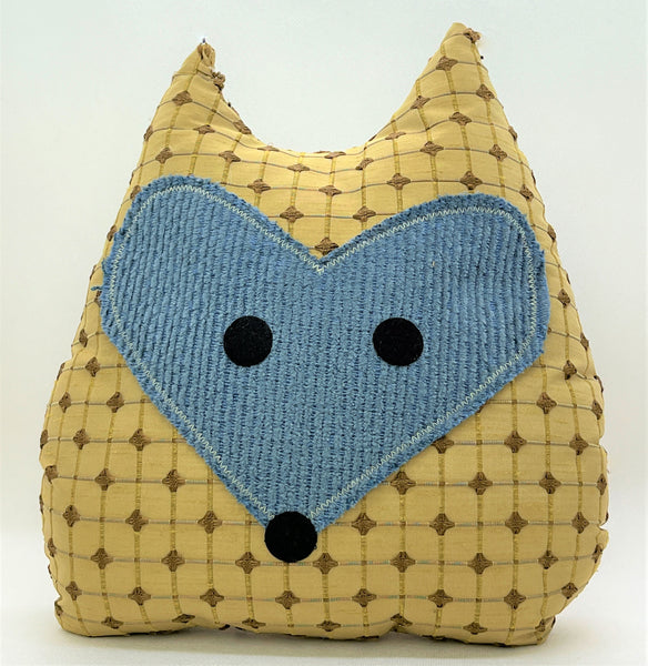 Beige checked fox pillow with blue accent