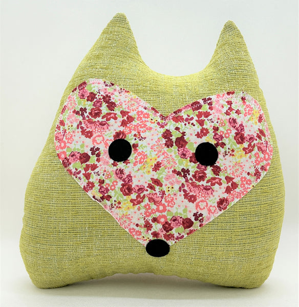 Bright green fox pillow with pink and green floral print