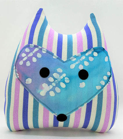 Fox pillow with purple striped fabric and coordinating batik