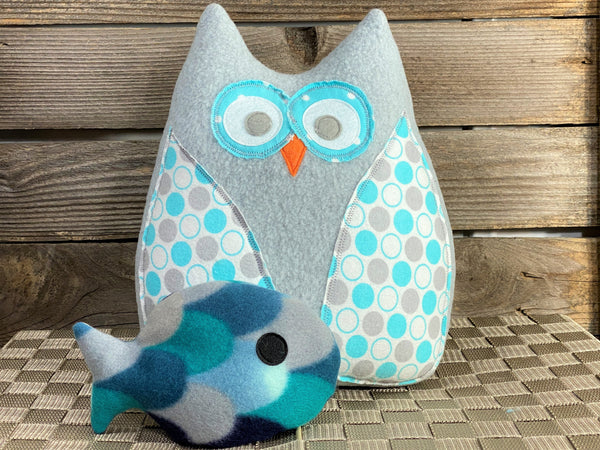 Gray owl pillow with teal dots and a blue hot and cold fish for boo boos