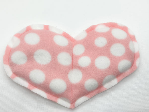 heart in a pink print with white polka dots