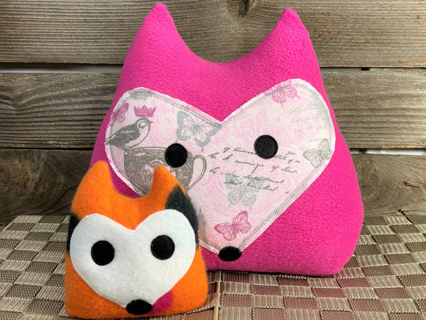 Hot pink fox pillow with pink and gray roses birds and butterflies with an orange fox hot and cold pack